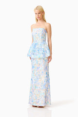 Brunette model wearing the Kalissa Strapless Gown in Blue Floral side shot