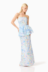 Brunette model wearing the Kalissa Strapless Gown in Blue Floral posed shot