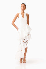 Brunette model wearing the Elizabeth Asymmetrical Gown in White posed shot 
