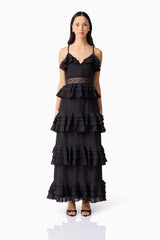 Brunette model wearing the Lucinda Tiered Gown in Black front shot 