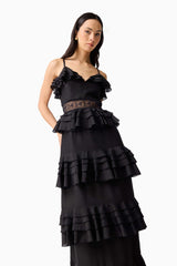 Brunette model wearing the Lucinda Tiered Gown in Black close up shot 