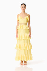 Brunette model wearing the Lucinda Tiered Gown in Lemon Yellow front shot 