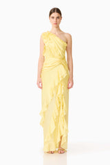 Brunette model wearing the Lucinda One Shoulder Gown in Lemon Yellow front shot 
