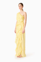 Brunette model wearing the Lucinda One Shoulder Gown in Lemon Yellow side shot 