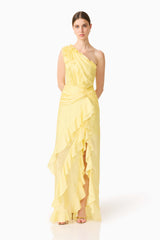 Brunette model wearing the Lucinda One Shoulder Gown in Lemon Yellow posed shot 
