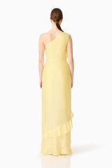 Brunette model wearing the Lucinda One Shoulder Gown in Lemon Yellow back shot 