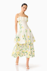 Brunette model wearing the Hana Tiered Maxi Dress in Lemon Print posed shot 