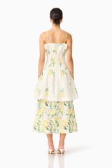 Brunette model wearing the Hana Tiered Maxi Dress in Lemon Print back shot 