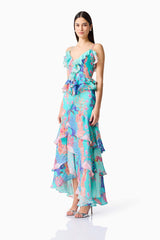 Brunette model wearing the Coral Tiered Gown in Blue Multi side shot 