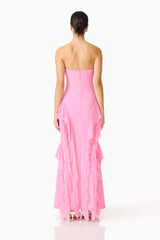Brunette model wearing the Amelina Strapless Gown in Pink back shot 
