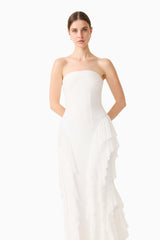 Brunette model wearing the Amelina Strapless Gown in White close up shot 