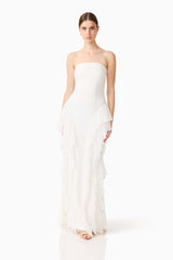 Brunette model wearing the Amelina Strapless Gown in White posed shot 