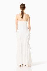 Brunette model wearing the Amelina Strapless Gown in White back shot 