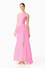 Brunette model wearing the Amelina Sash Gown in Pink side shot