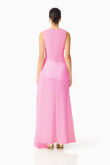 Brunette model wearing the Amelina Sash Gown in Pink back shot