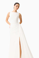 Brunette model wearing the Amelina Sash Gown in White close up shot 