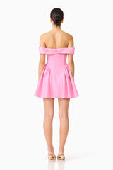 Brunette model wearing the Amelina Off Shoulder Mini Dress in Pink back shot 