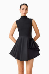 Brunette model wearing the Nydia A-Line Mini Dress in Black close up shot