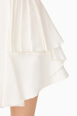 Brunette model wearing the Nydia A-Line Mini Dress in White detail shot