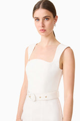 Brunette model wearing the Nydia Fit & Flare Maxi Dress in White close up shot 