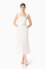 Brunette model wearing the Nydia Fit & Flare Maxi Dress in White posed shot 