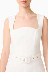 Brunette model wearing the Nydia Fit & Flare Maxi Dress in White close up detail shot 