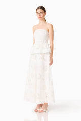 Model wearing the Celine Strapless Maxi Dress in White side shot 