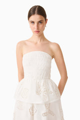 Model wearing the Celine Strapless Maxi Dress in White close up shot 