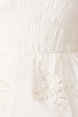 Model wearing the Celine Strapless Maxi Dress in White detail shot 