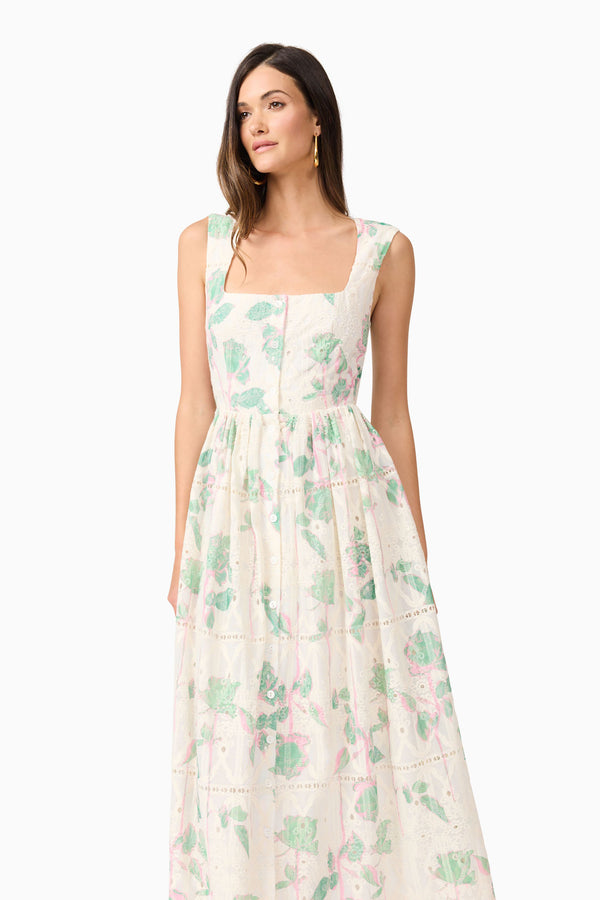 Brunette model wearing Kierra Floral Midi Dress in White close up looking away shot