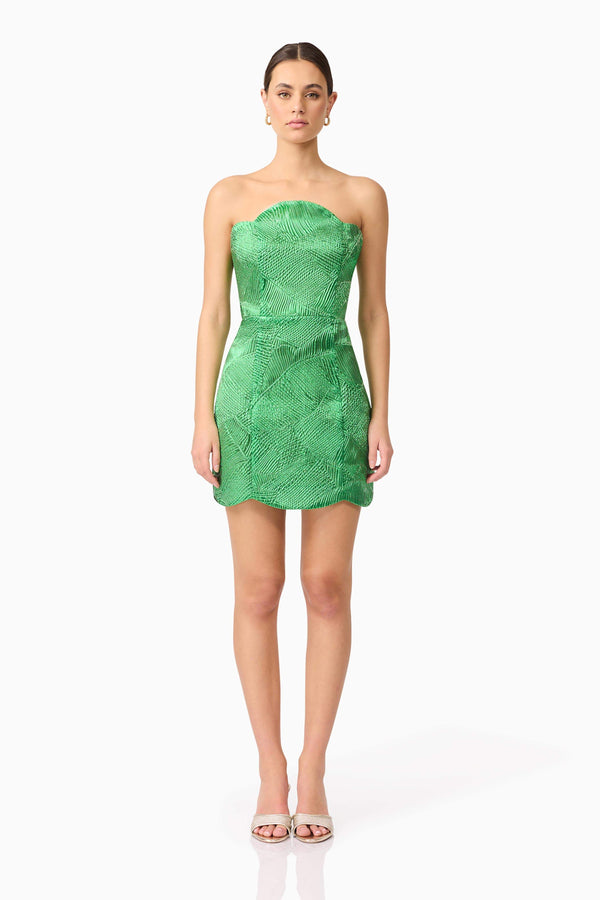 Brunette model wearing Ginnifer Strapless Mini Dress in Green front shot