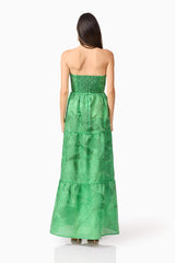Brunette model wearing Ginnifer Strapless Maxi Dress in Green back shot
