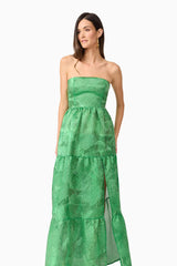 Brunette model wearing Ginnifer Strapless Maxi Dress in Green close-up shot