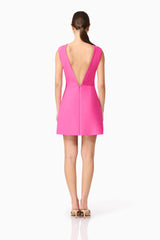 Brunette model wearing Celina Low Back Mini Dress in Pink back shot