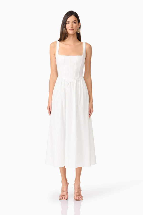 Brunette model wearing Ingrud Corset Midi Dress in White front shot
