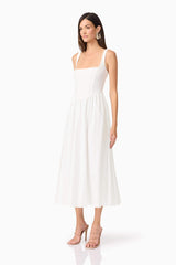 Brunette model wearing Ingrud Corset Midi Dress in White side shot