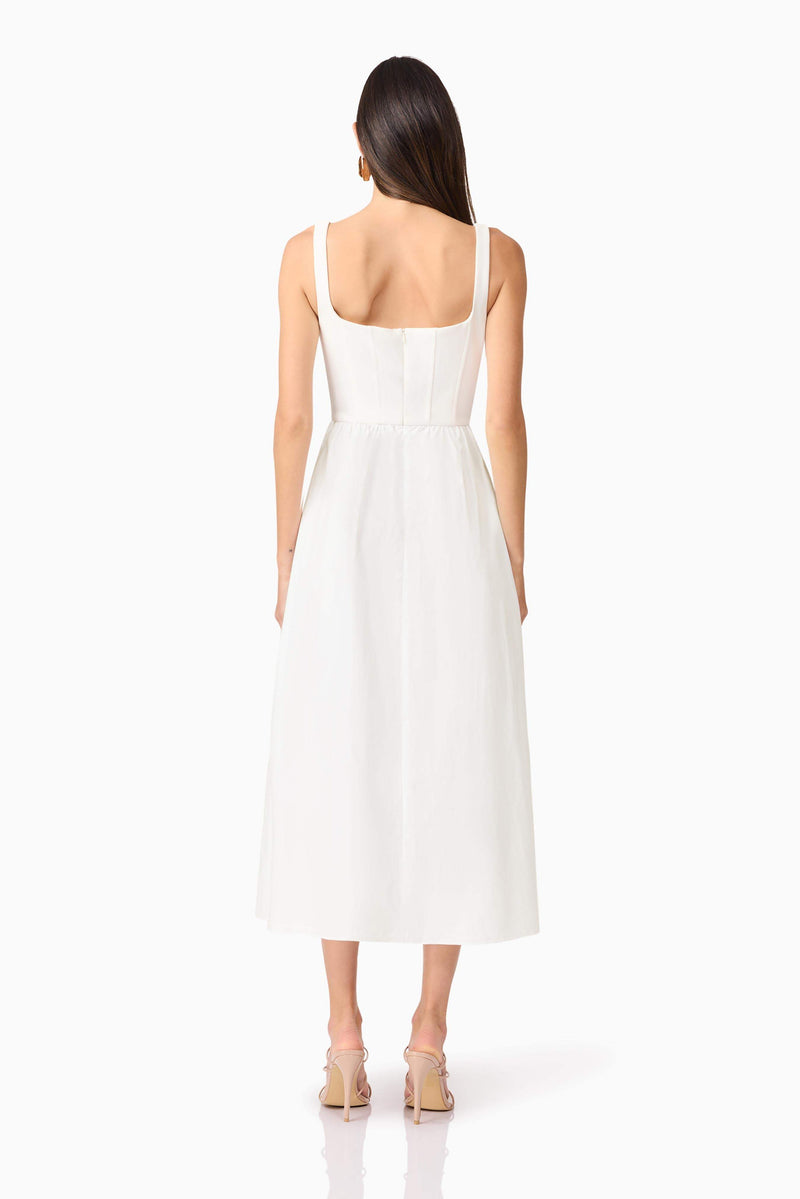 Brunette model wearing Ingrud Corset Midi Dress in White back shot