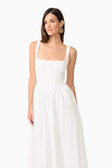 Brunette model wearing Ingrud Corset Midi Dress in White close up shot