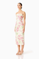 Brunette model wearing the Greta Embroidered Midi Dress in Cream & Pink Floral side shot