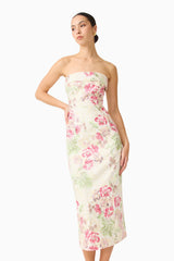 Brunette model wearing the Greta Embroidered Midi Dress in Cream & Pink Floral close up shot