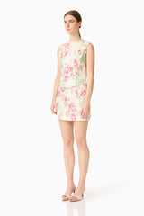 Brunette model wearing the Greta Embroidered Set in Cream & Pink Floral side shot