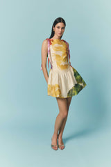 Brunette model wearing the Lilia A-Line Mini Dress in Multi Floral campaign shot