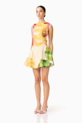 Brunette model wearing the Lilia A-Line Mini Dress in Multi Floral side shot