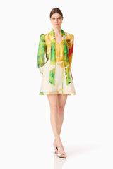 Brunette model wearing the Lilia Long Sleeve Mini Dress in Multi Floral posed shot 