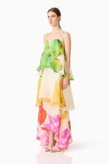Brunette model wearing the Lilia Tiered Gown in Multi Floral side shot 