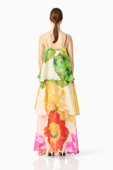 Brunette model wearing the Lilia Tiered Gown in Multi Floral back shot 