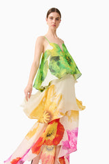 Brunette model wearing the Lilia Tiered Gown in Multi Floral close up shot 