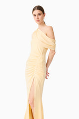 Brunette model wearing the Simone One Shoulder Maxi Dress in Butter Yellow close up shot