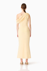 Brunette model wearing the Simone One Shoulder Maxi Dress in Butter Yellow back shot
