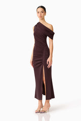 Brunette model wearing the Simone One Shoulder Maxi Dress in Chocolate Brown side shot 